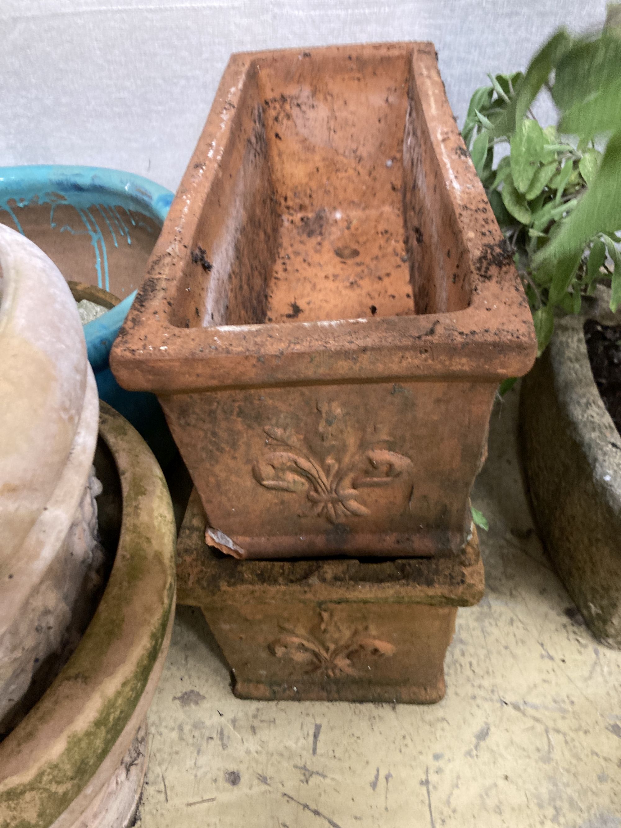 Five assorted garden planters, a wirework chicken ornament and assorted reconstituted stone ornaments, largest 83cm high